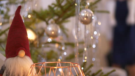 santa claus decoration, christmas tree and defocused background with excited jumping kid, static