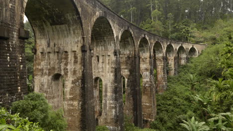 jib shot of nine arches bridge and tea fields in ella sri lanka