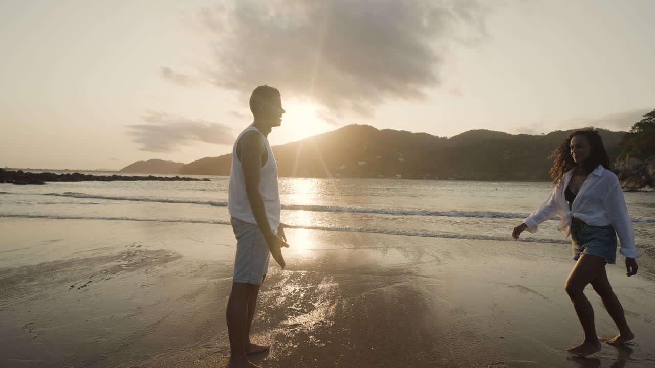 Woman jumping on his boyfriend's arms