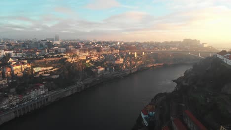 aerial view of douro river and the city of porto during sunset-sunrise