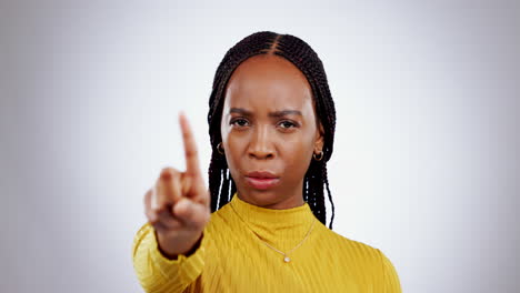 face, frown and finger wagging with a black woman