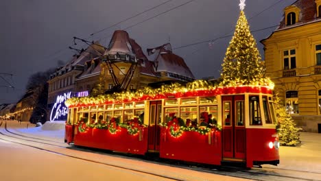 christmas tram in a snowy city