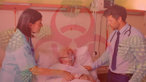 hazard sign and covid-19 spreading over a senior patient wearing an oxygen mask in background.