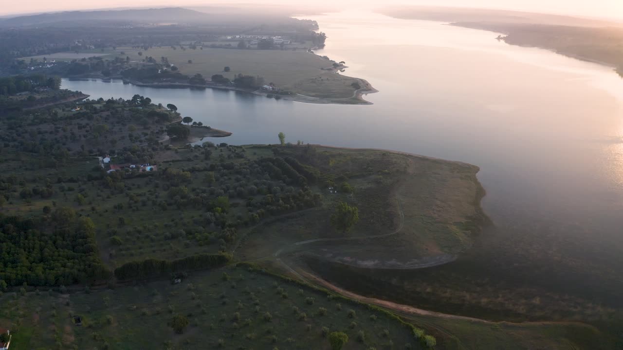 Aerial view of the Montargil, Portalegre, Portugal, landscape on a huge sunrise in 4K