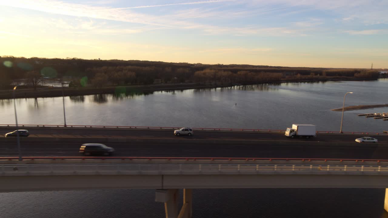 Aerial shot alongside traffic as it crosses Hastings Bridge, Minnesota.