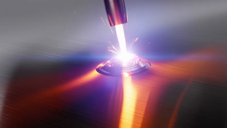 laser welding or cutting process with bright sparks and light