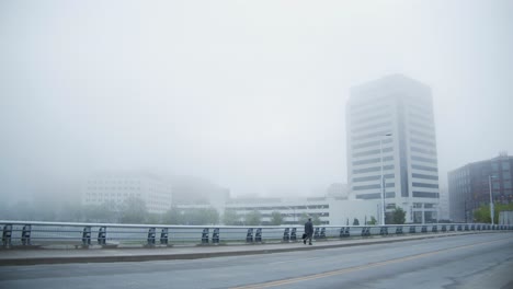 early morning commute during foggy morning in columbus ohio downtown