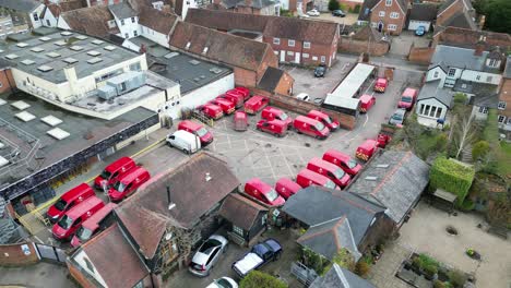 post office depot vans parked saffron walden essex uk drone aerial view