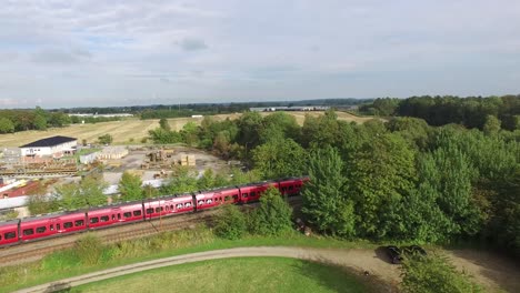 Passenger-train-moving-in-the-danish-landscape