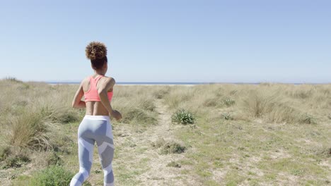 woman jogging on the beach