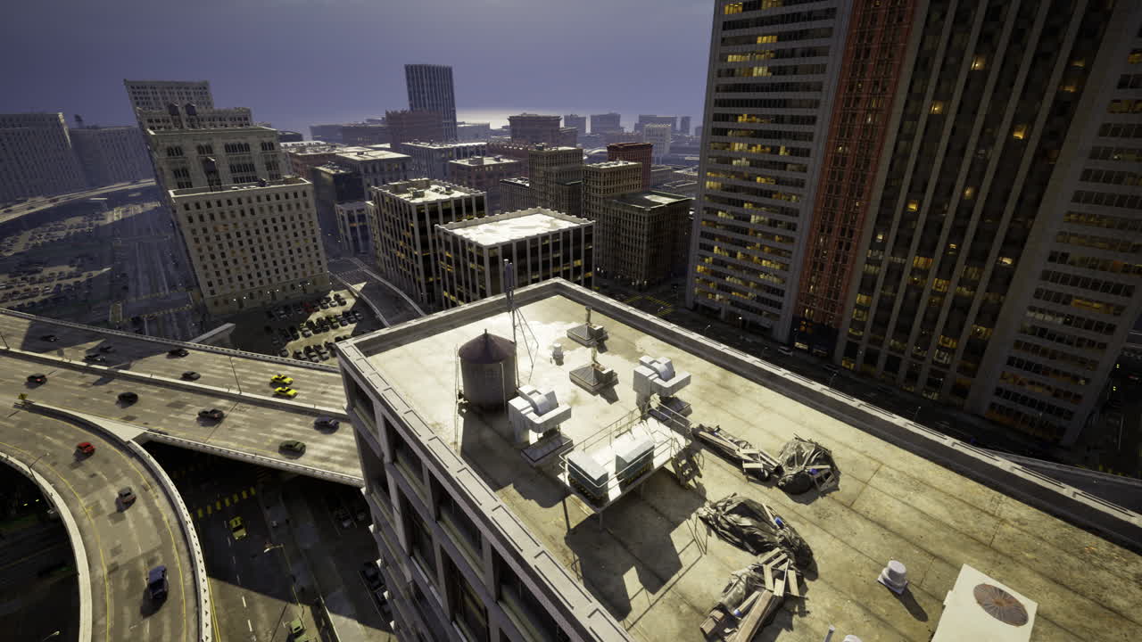 City skyline viewed from rooftop in urban setting during late afternoon