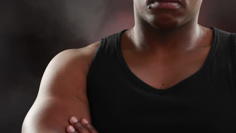 athletic man with background of clouds and lightning