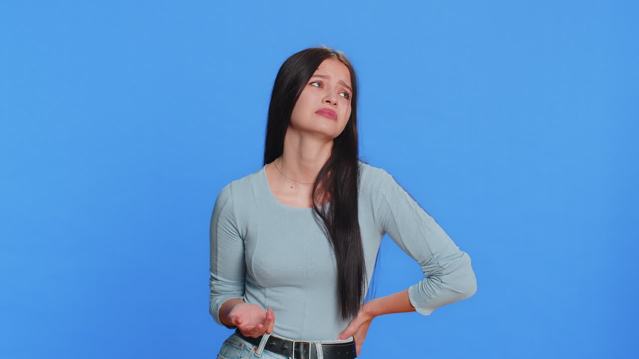 Young sad woman loses becoming surprised by lottery results bad fortune loss unlucky fortune news