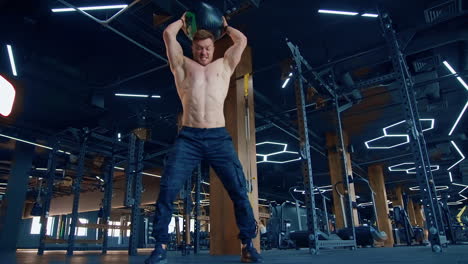 workout in the hardcore gym. muscular bodybuilder handsome men doing exercises in gym