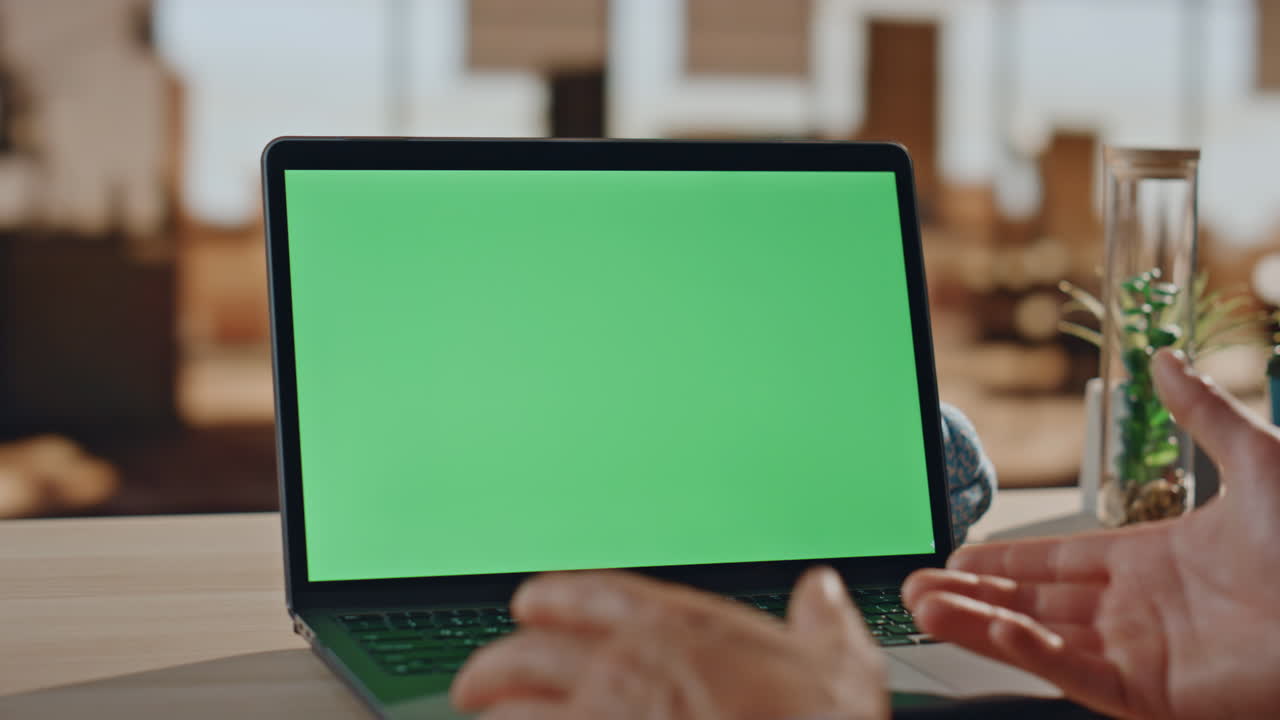 Man hands videocalling chromakey computer at table closeup. Businessman talking