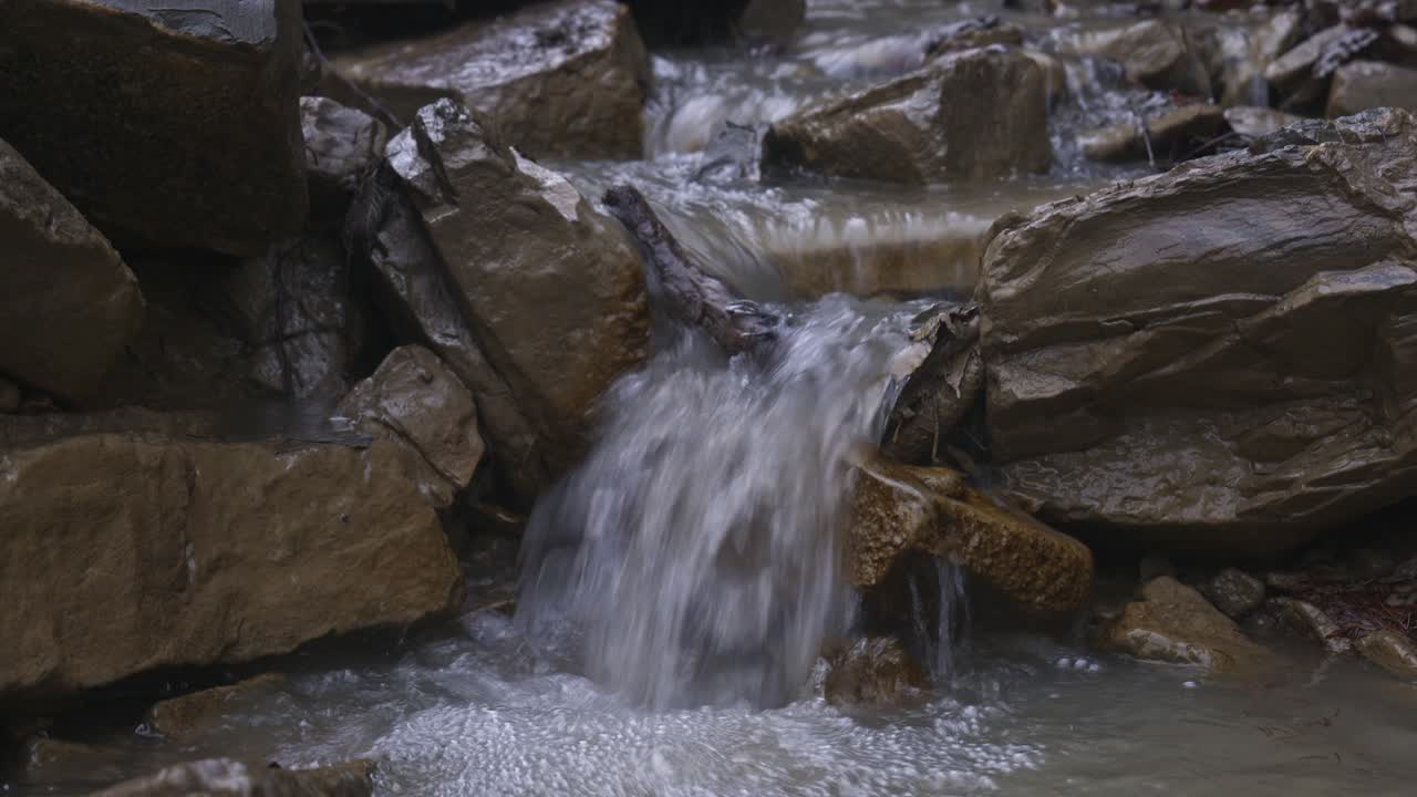 Small Clear Waterfall Cascade Through Rocks In Nature, Padure, Latvia
