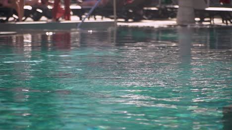 close up of water in holiday hotel swimming pool