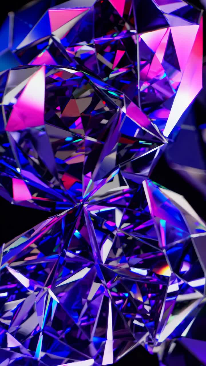 Close-up video of green and blue crystal facets, creating a kaleidoscopic effect