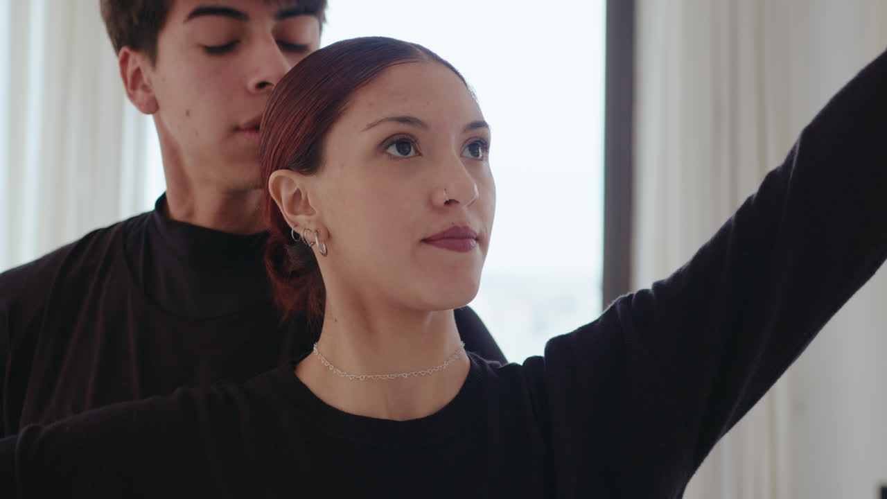 Young Ballet Duet Performing Fish Dive Lift on Rehearsal