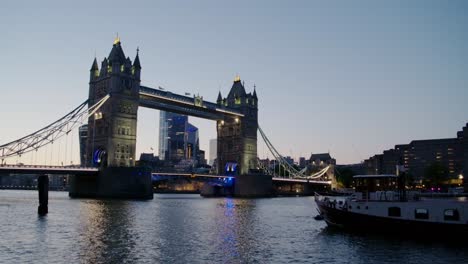 Reveal the Tower Bridge at night.