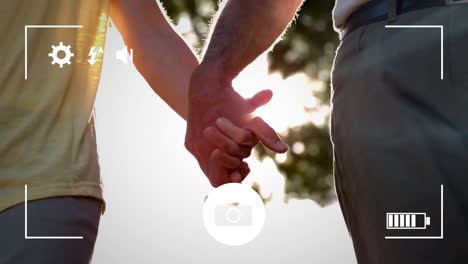 Taking-photos-of-a-couple-on-a-digital-camera