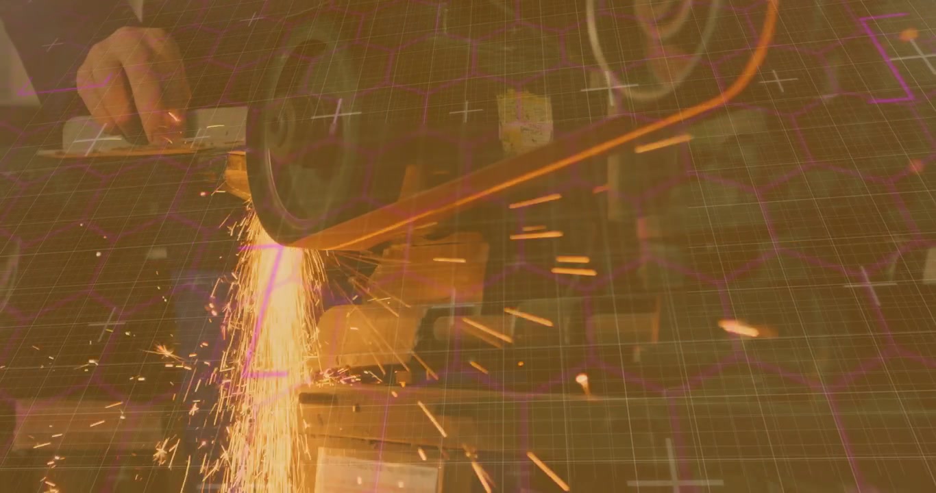 Spinning bench grinder belt initiating craftsman's hand guiding bar into sparks sharpening metal
