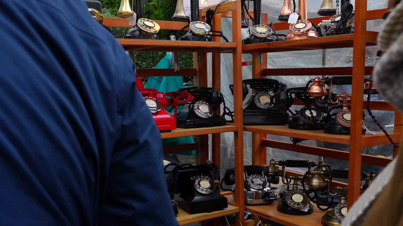 Antique Telephones on Display at Outdoor Market