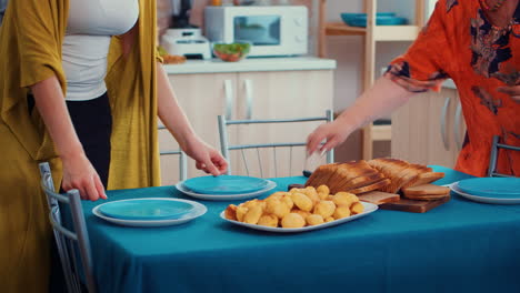 Close-up-of-family-dinner-table-set