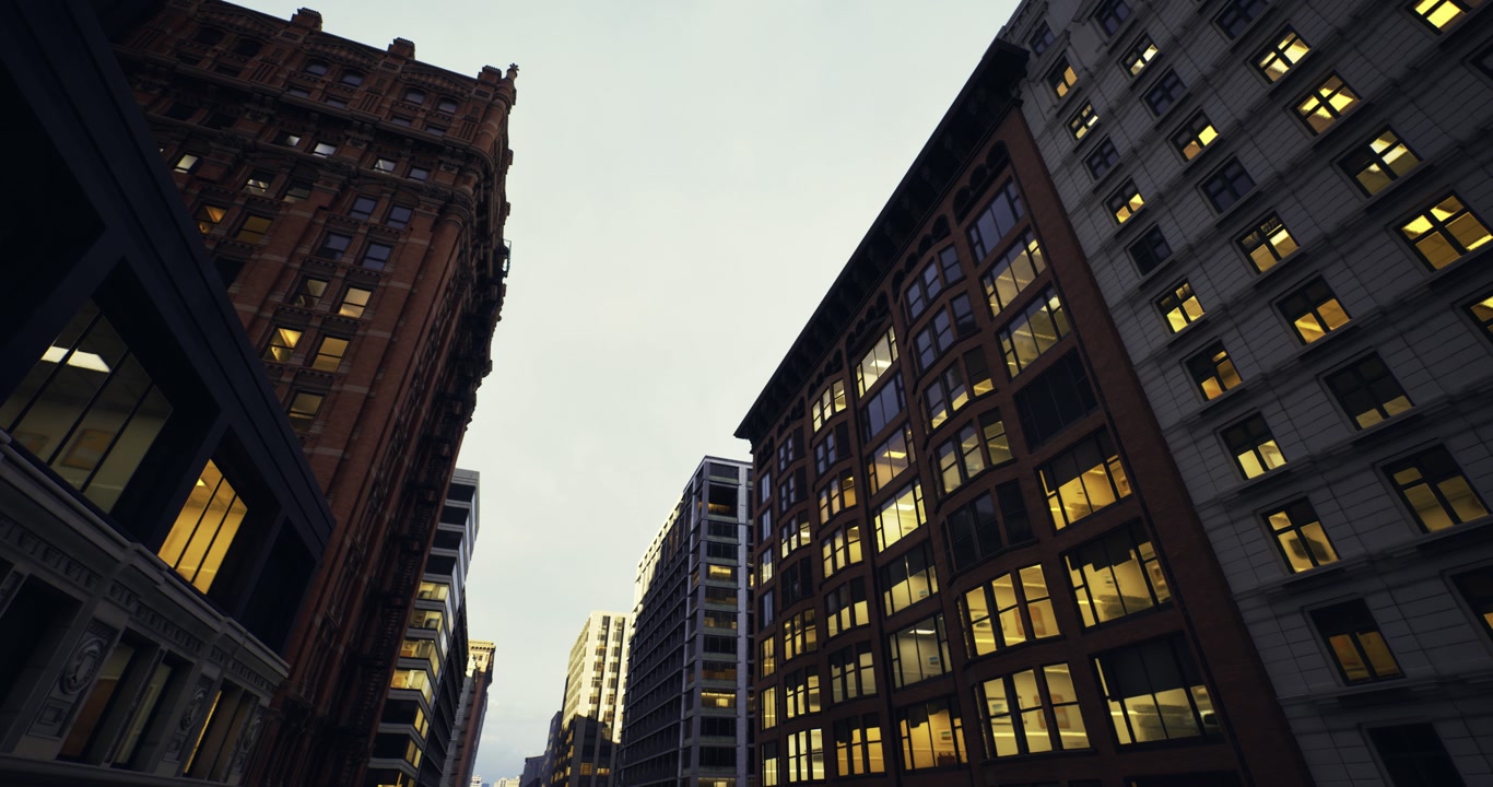 Symmetrical glass pathways reflect illuminated cityscape ambiance