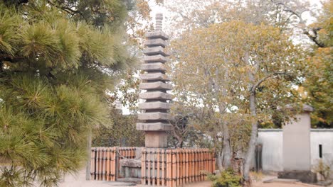 Slide-shot-of-an-old-pagoda-in-a-temple-in-Kyoto,-Japan-4K-slow-motion