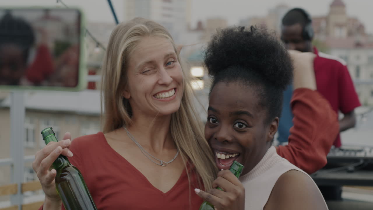 Friends Having Fun at a Rooftop Party