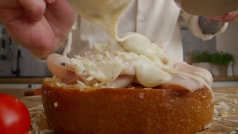 preparing a croque monsieur