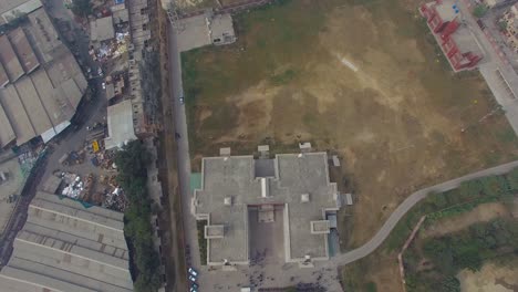 top shot of a school with zooming in, bombay, india, students are walking