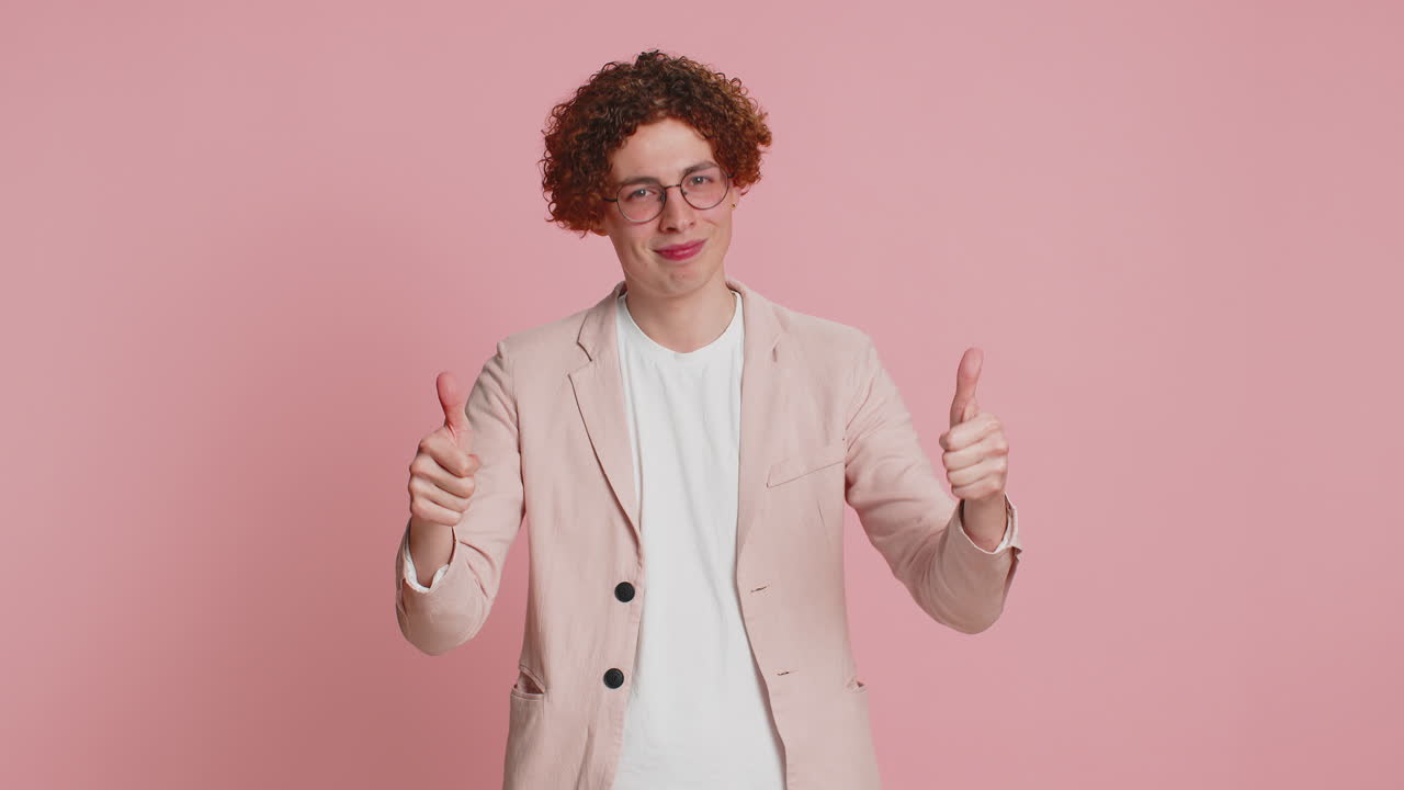 Proud man applauds and nodding in approval successful good perfect job work positive feedback okay