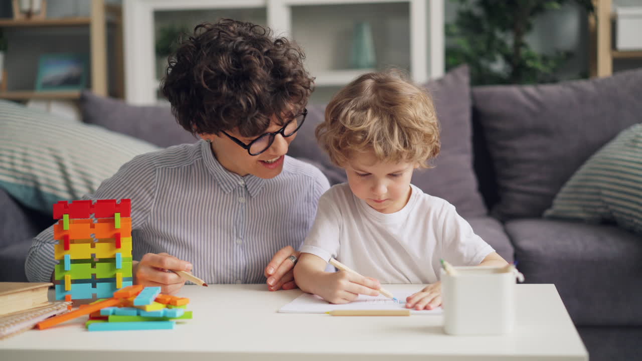 Mother and Son Learning and Playing Together