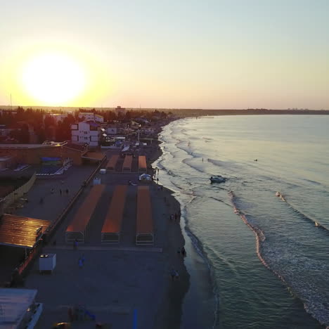 aerial view from the air to the resorts and a place to relax on the beach. beautiful sky sunset times