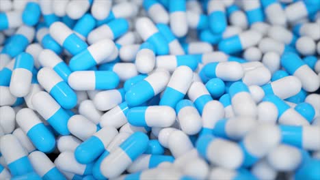 pile of blue and white capsules