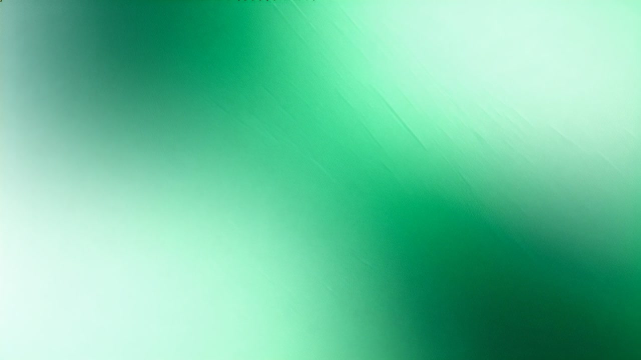 Shifting blurred green gradient in frames with pale mint glow and dark round patch, camera moving