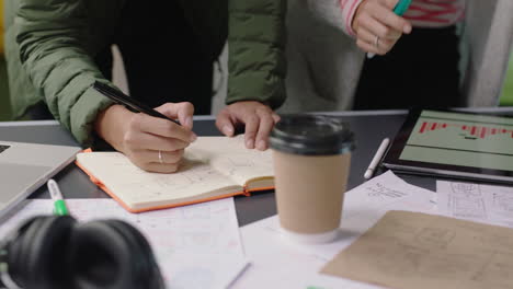 close-up-business-people-engineers-developing-software-app-web-developers-brainstorming-solution-planning-design-collaborating-in-office-meeting