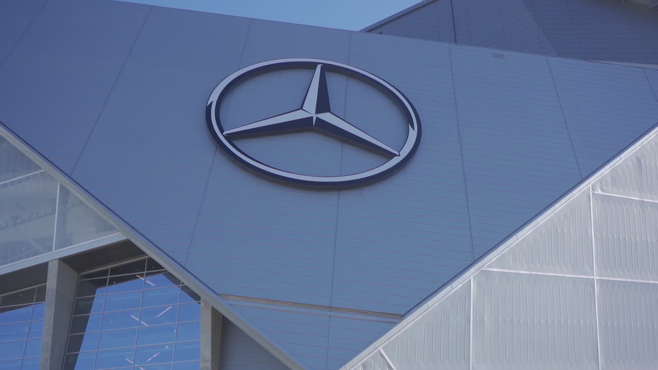 Mercedes-Benz Stadium overlooks the Downtown Atlanta Cityscape.