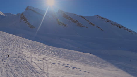 ski area in the swiss alps with people and chairlifts in the winter ski area of beckenried