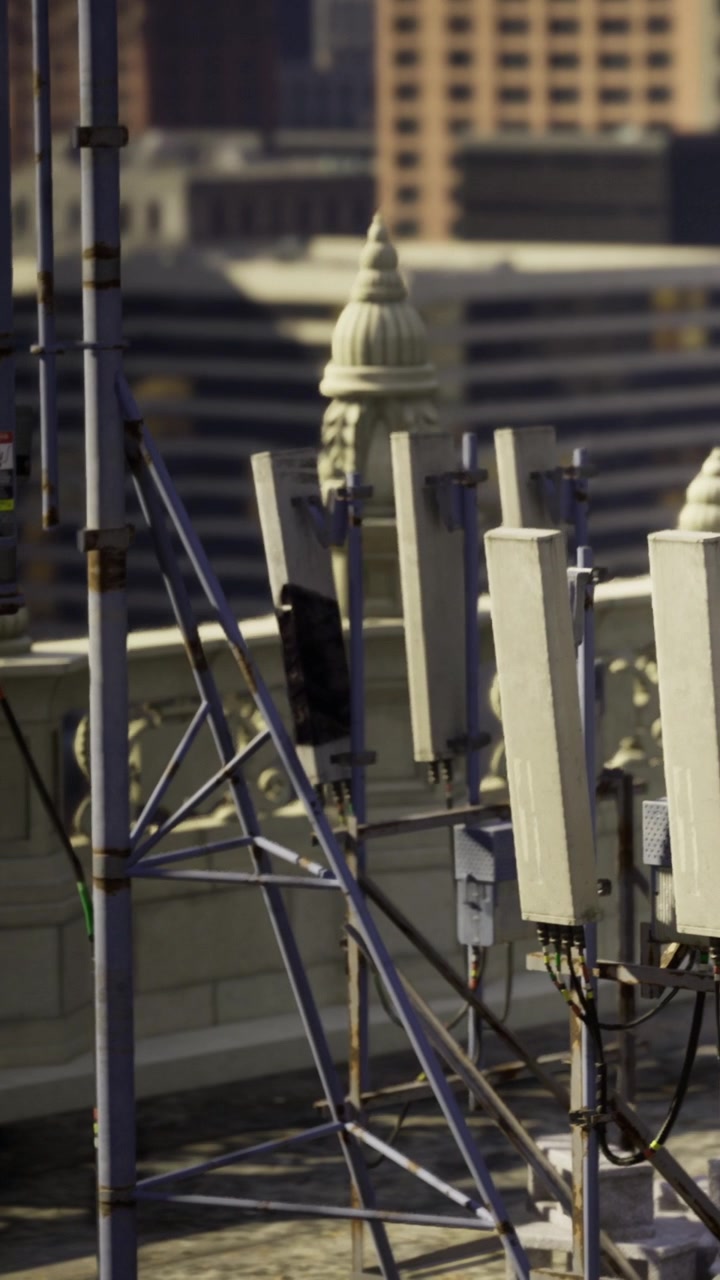 Signal towers soar in the bustling city during the day