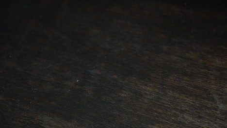gold bitcoins on a wooden table