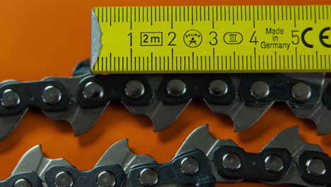 extreme close up of chainsaw chain