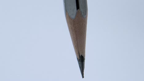 putting pencil in sharpener closeup