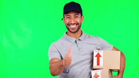 hombre asiático, cajas y pulgares en la pantalla verde