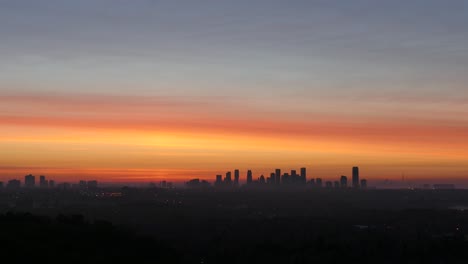 skyline silhouette during a beautiful golden sunset with fogs