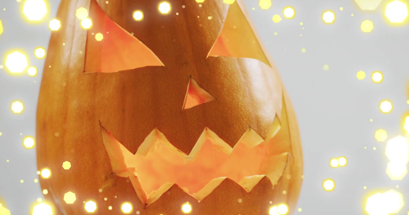 Zucca luminosa, con scintille dorate che appaiono, salgono, turbinano e poi svaniscono per creare un'atmosfera festosa
