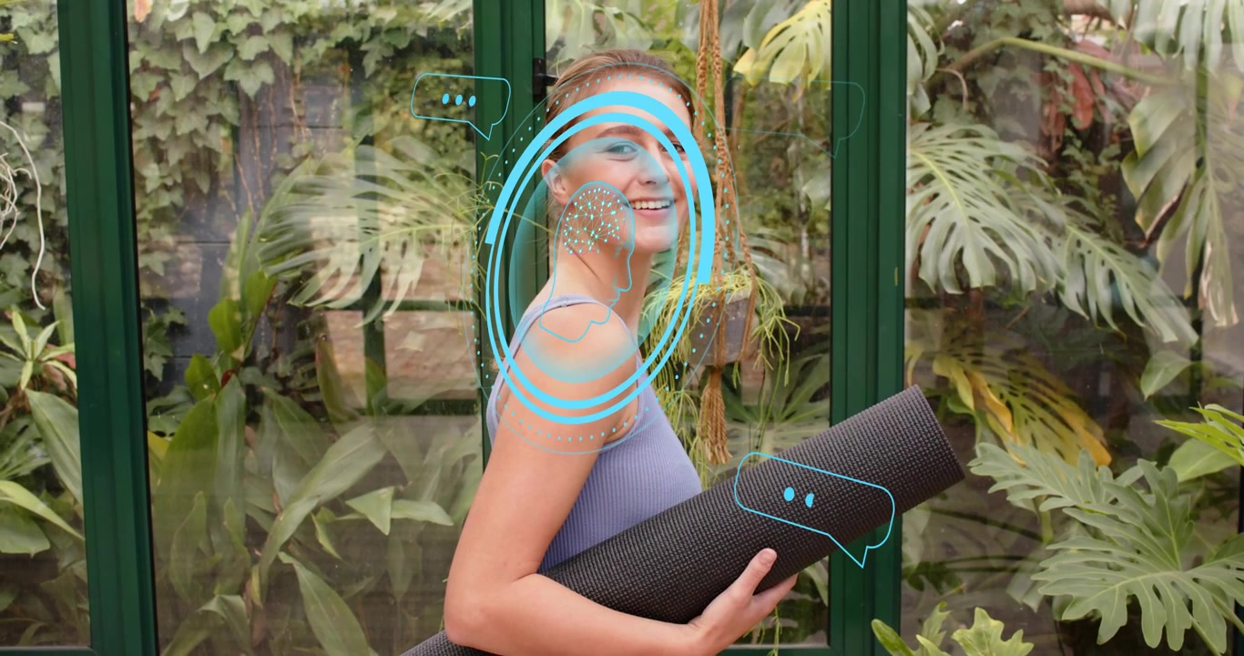 Female entering conservatory carrying yoga mat activating fitness interface with chat bubbles