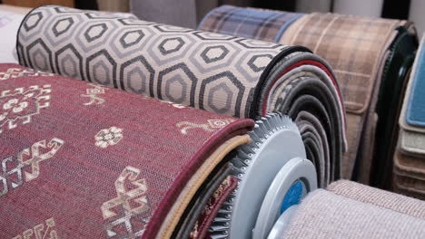 Customer-looks-through-some-carpet-samples-in-a-carpet-shop